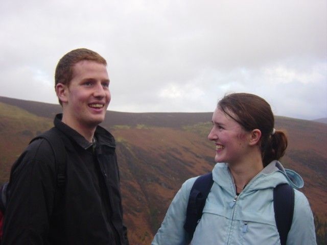 Mike pretends to understand Caroline's joke